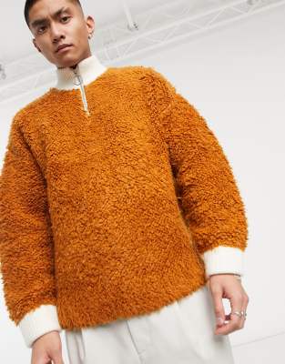 orange half zip sweater