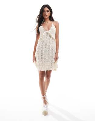 ASOS DESIGN knitted strappy mini dress with broderie trim in cream-White