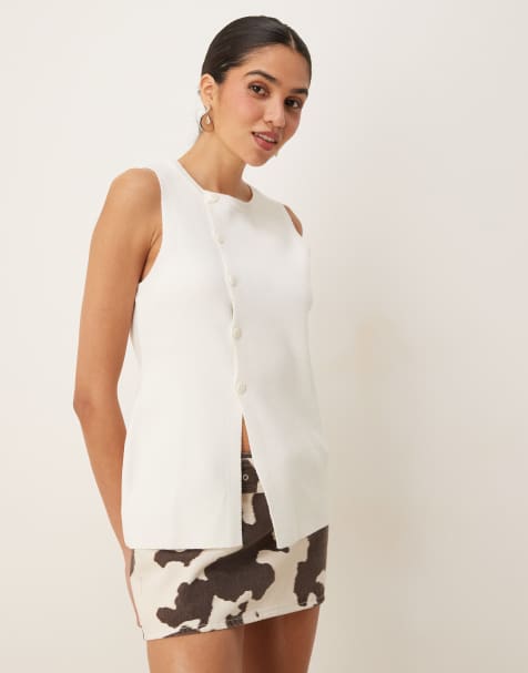 ASOS DESIGN knitted structured asymmetric button front waistcoat with split in cream - view 1