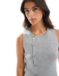 [ASOS DESIGN] ASOS DESIGN knitted structured asymmetric button front waistcoat with split in grey XS Grey