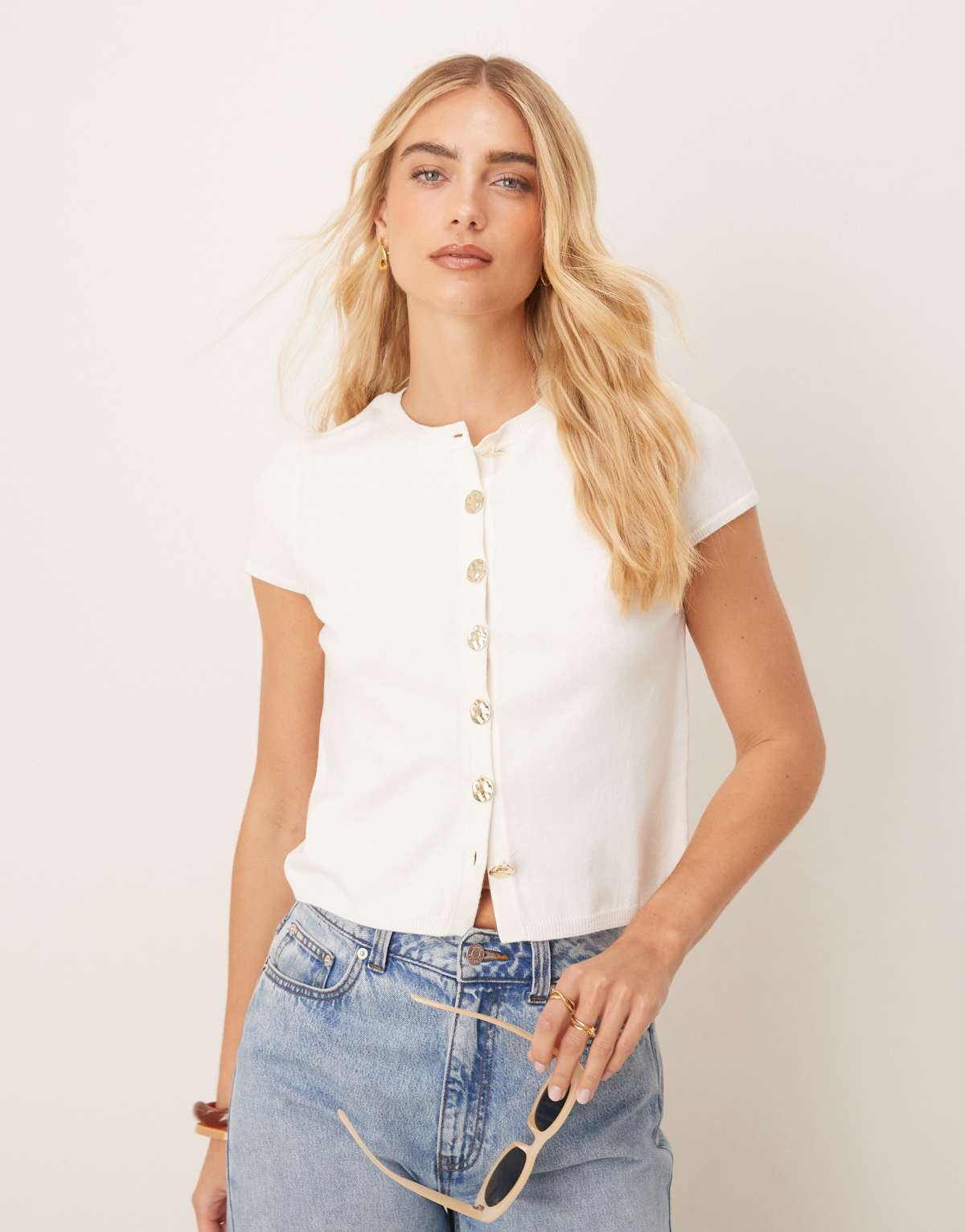 ASOS DESIGN knitted structured cap sleeve cardigan with gold buttons in cream