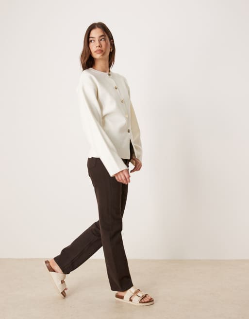 ASOS DESIGN knitted structured crew neck cardigan with gold buttons in cream
