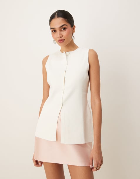 ASOS DESIGN knitted structured crew neck waistcoat with front split in white