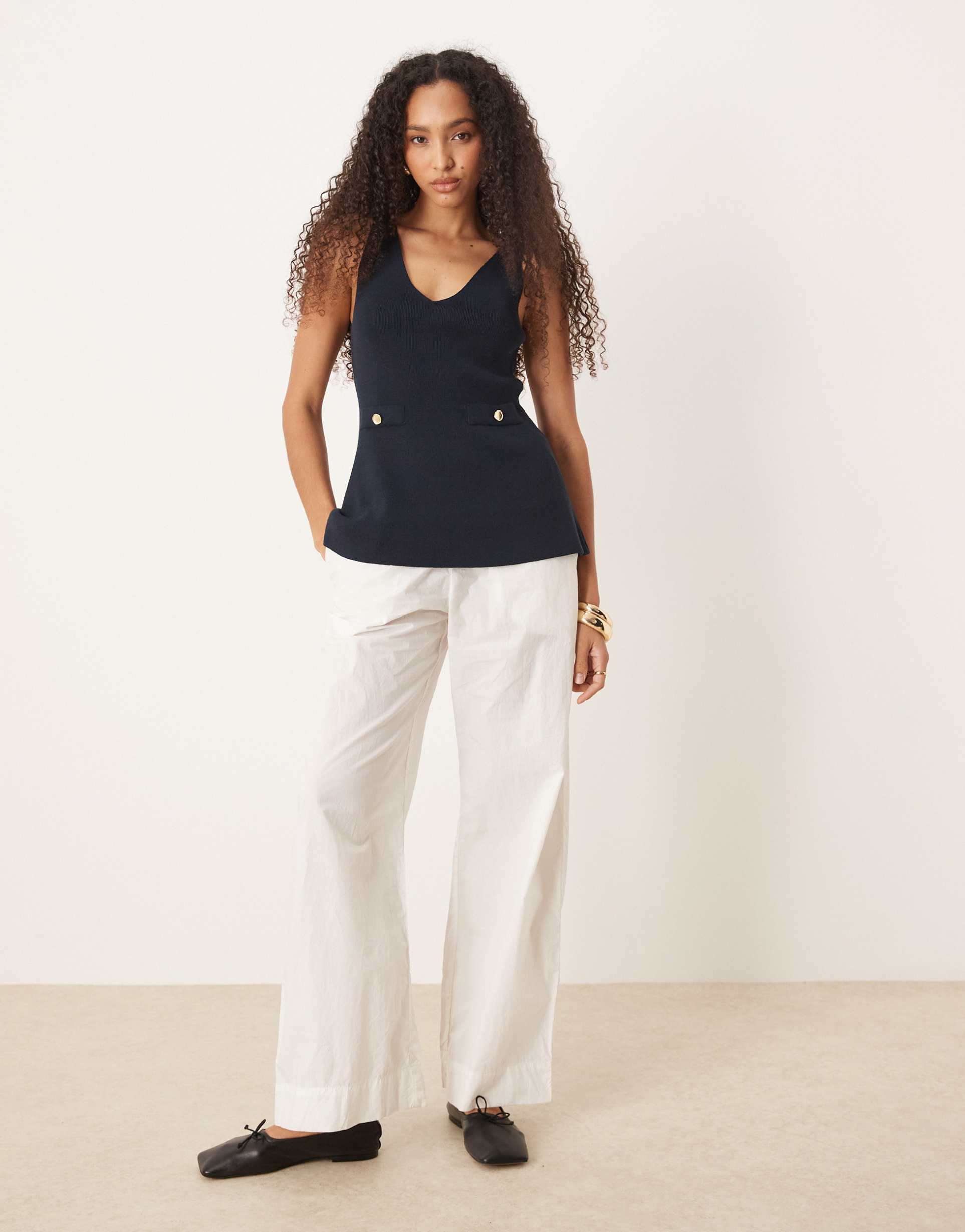 asos design knitted structured peplum top with lapels in navy