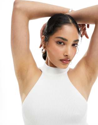 ASOS DESIGN knitted tank top with high halter neck in white