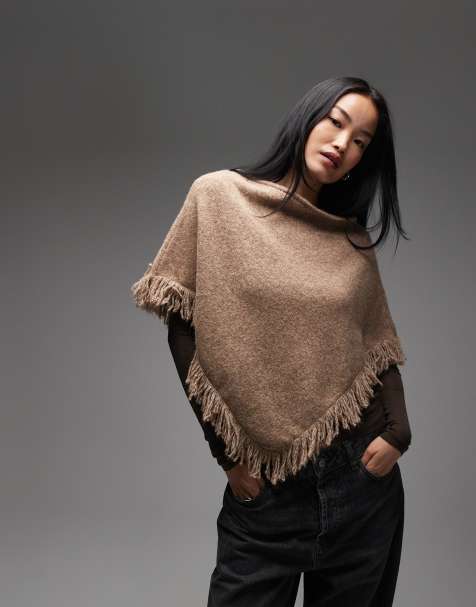ASOS DESIGN knitted tassel poncho in honey beige - view 1