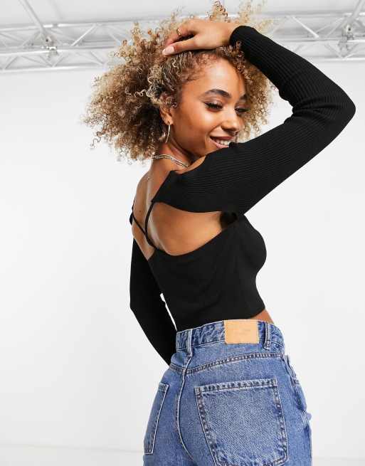 ASOS DESIGN knitted top with cut out shoulder and neck detail in black