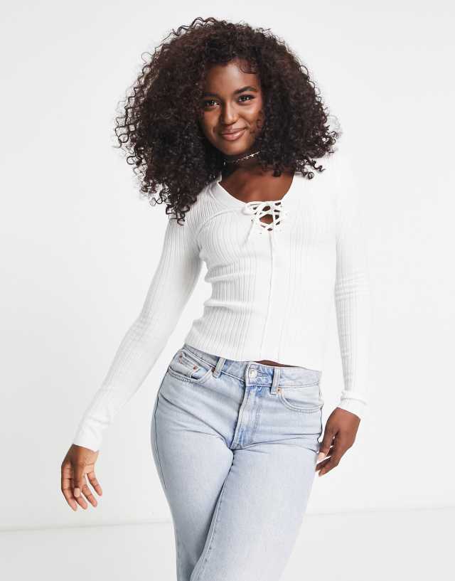 ASOS DESIGN knitted top with lace up detail in cream