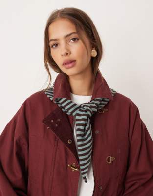 ASOS DESIGN knitted triangle scarf in blue and chocolate stripe-Multi