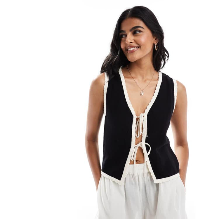ASOS DESIGN knitted vest with contrast tipping in black and