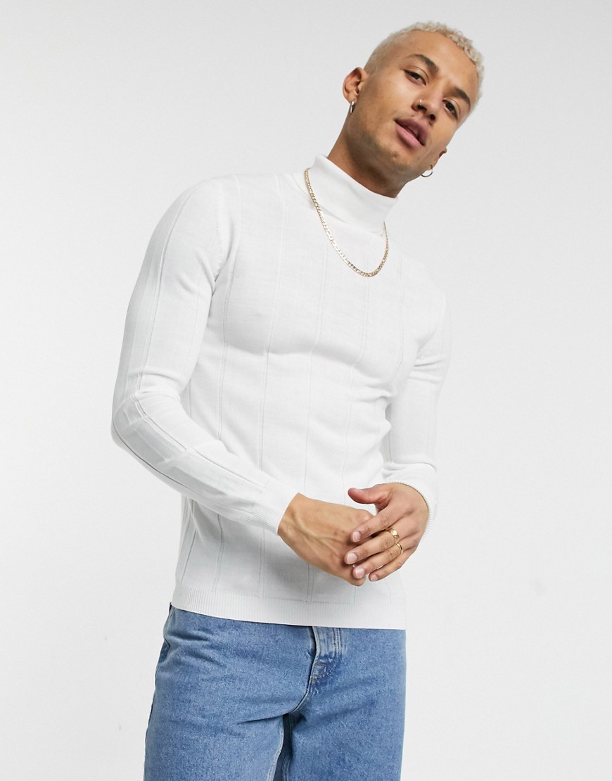 ASOS DESIGN knitted wide rib roll neck sweater in white