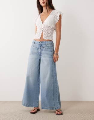 Knöchellange Jeans in heller Waschung mit weitem Bein und Vordertaschen-Blau Blau 36