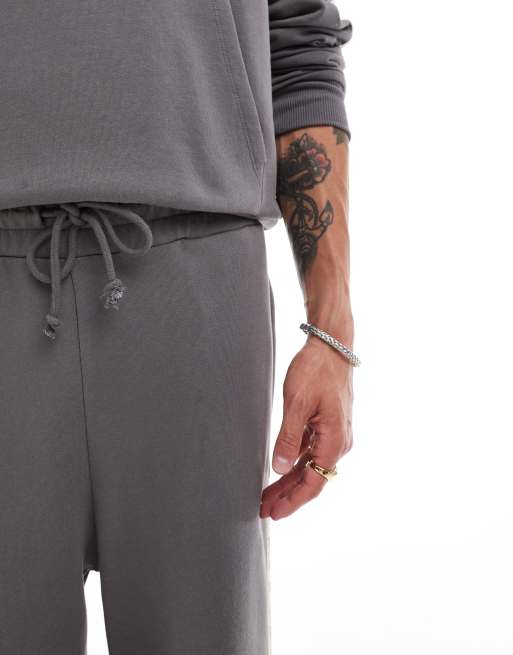 ASOS DESIGN - Koksgrå joggingbukser med ekstremt vide ben og skrå sidebånd med tekstprint, 4 af 5