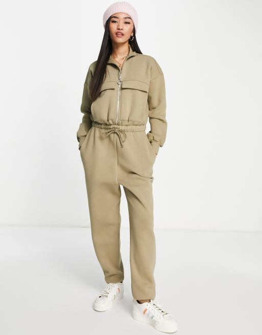 ASOS DESIGN – Kombinezon z joggersami ze szczotkowanym wykończeniem polarowym w kolorze khaki z zamkiem do połowy