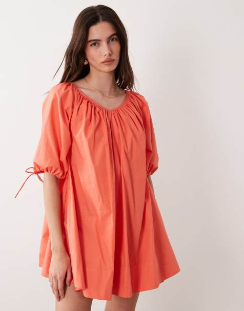 ASOS DESIGN – Korallfärgad miniklänning i poplin med djup halsringning och knytning på ärmarna - view 1