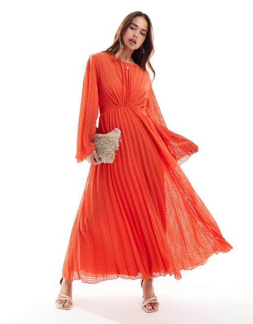 ASOS DESIGN – Koralowa, plisowana sukienka midi z wiązaniem z tyłu, rozkloszowanymi rękawami i wzorem w jodełkę