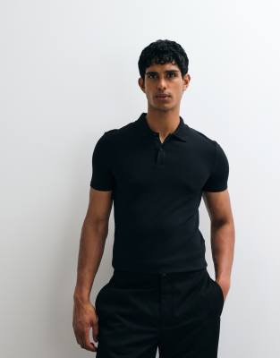 Körperbetontes Basic-Polohemd aus Pikee in Schwarz Schwarz S