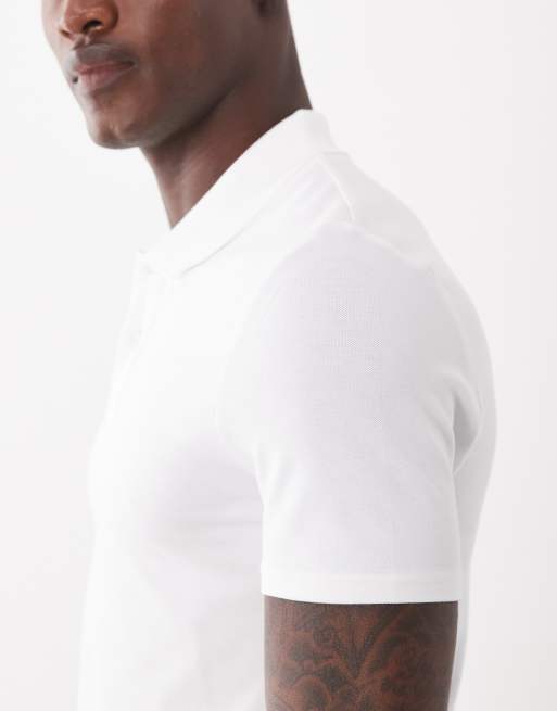 ASOS DESIGN – Körperbetontes Basic-Polohemd aus Pikee in Weiß, 4 von 5