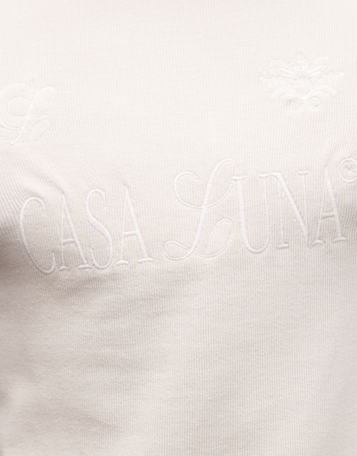 ASOS DESIGN – Körperbetontes T-Shirt in Cremeweiß mit Text-Grafik und Rippenstruktur, 5 von 5