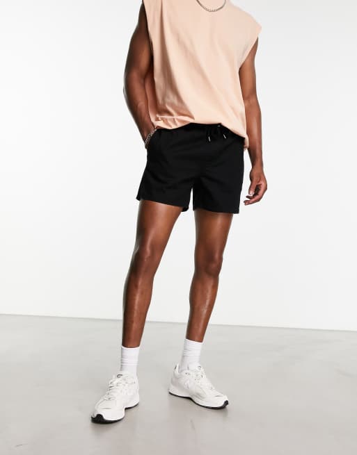ASOS DESIGN - Korte denim short met elastische taille in zwart