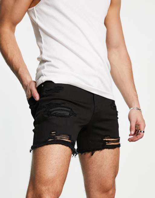 ASOS DESIGN - Korte denim short met grote scheuren en onafgewerkte zoom in zwart