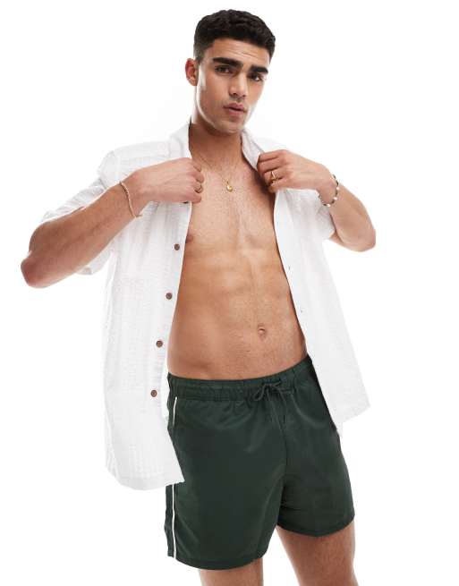 ASOS DESIGN - Korte zwemshort met biezen in groen