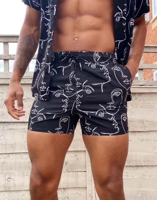 ASOS DESIGN - Korte zwemshort met getekende gezichtsprint