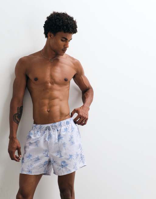 ASOS DESIGN - Korte zwemshort met palmboomprint in blauw met wassing, 5 van 5