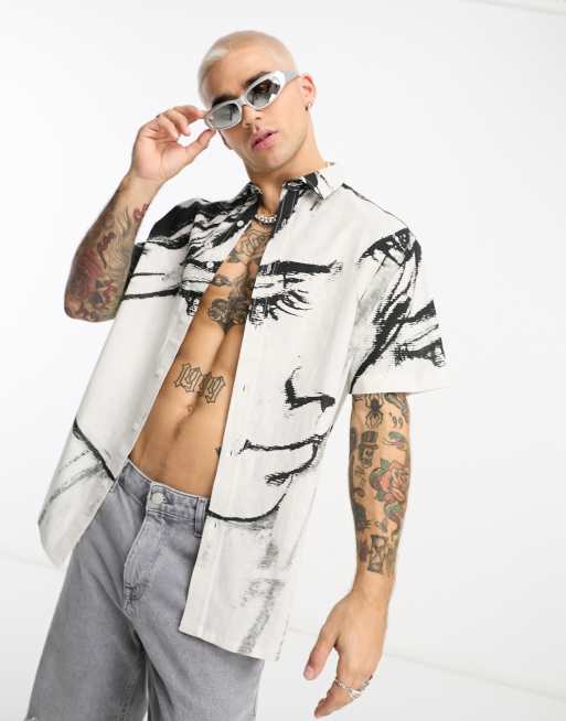 ASOS DESIGN – Koszula o luźnym kroju z mieszanki lnu we wzór z twarzą