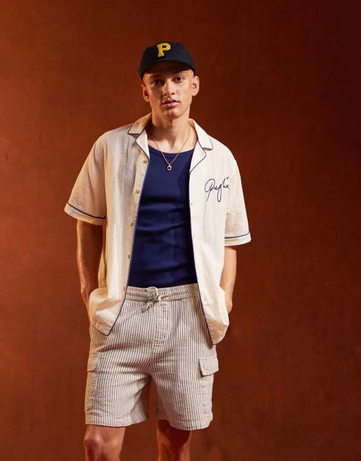 ASOS DESIGN – Koszula w żakardowe paski o luźnym kroju z kołnierzykiem kubańskim i haftem na piersi 