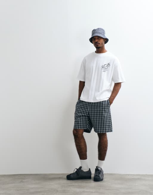 ASOS DESIGN kraftig oversize t-shirt med blommigt brösttryck i vit texturerad väv, 3 av 5