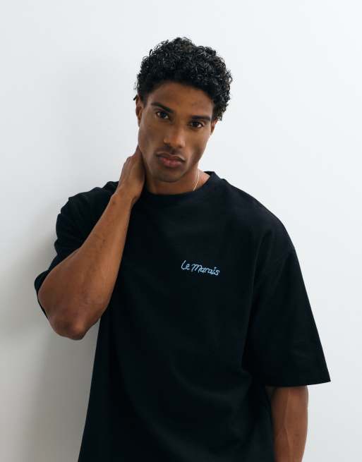 ASOS DESIGN kraftig oversized t-shirt med blommigt pufftryck i svart crepetyg, 2 av 5