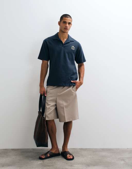 ASOS DESIGN kraftig polo i afslappet pasform med brystbroderi i navy seersucker-stribe, 3 af 5