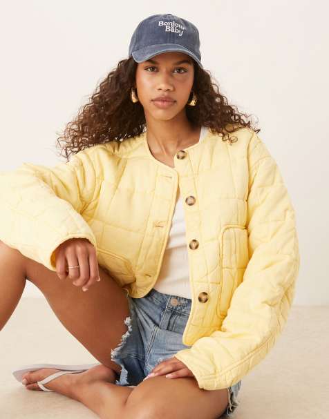 ASOS DESIGN – Kragenlose Cropped-Steppjacke in Zitronengelb - view 1