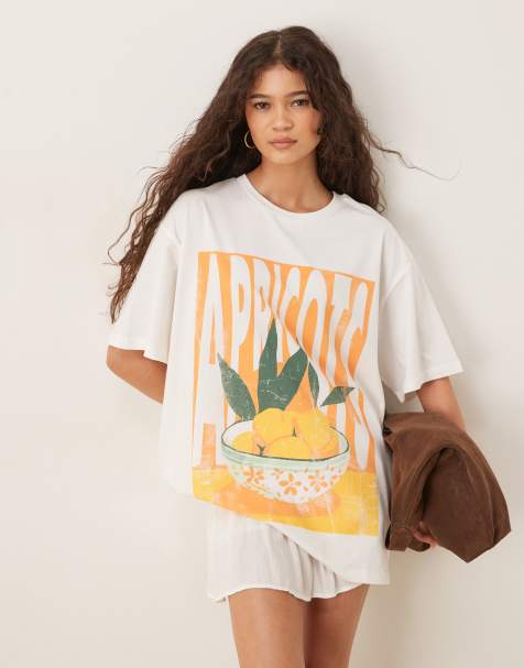 ASOS DESIGN – Krämvit t-shirt i oversize med aprikostryck - view 1