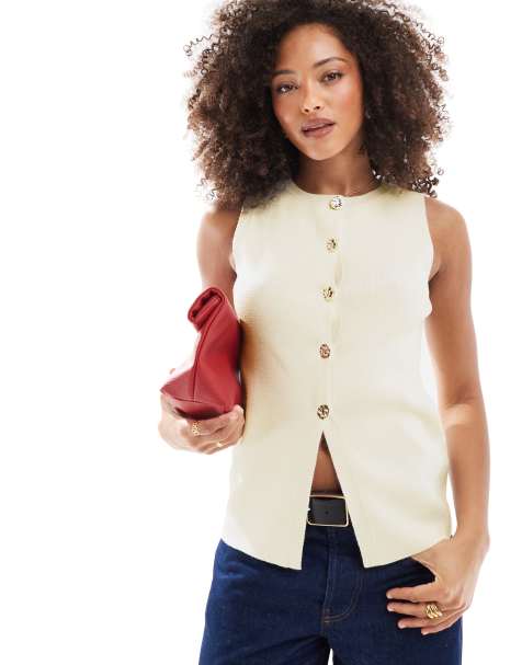 ASOS DESIGN knitted crew neck structured waistcoat with gold buttons in cream