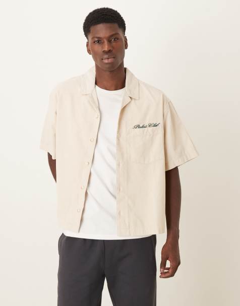 ASOS DESIGN oversized cord shirt with chest embroidery in cream