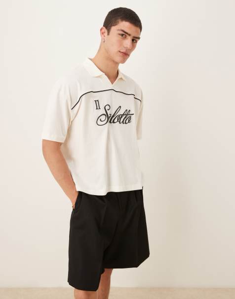ASOS DESIGN boxy oversized polo with text graphic in cream