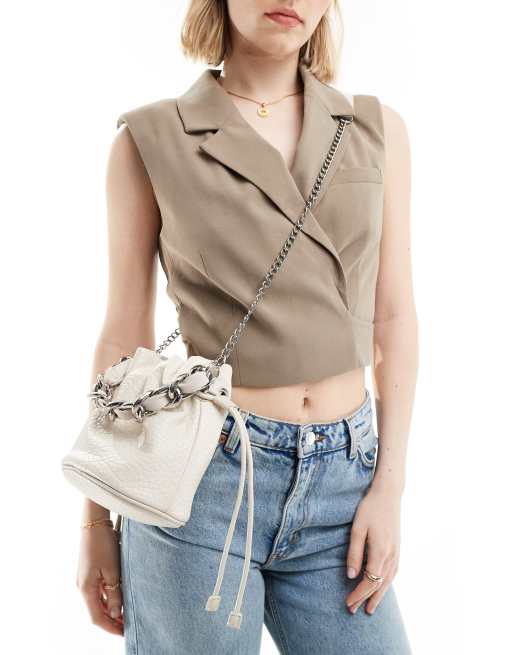ASOS DESIGN – Kremowa kubełkowa torebka z odpinanym paskiem crossbody