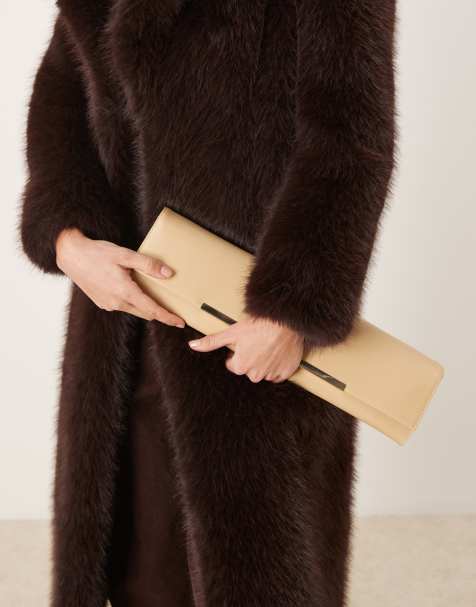 ASOS DESIGN – Kremowa wąska wydłużona kopertówka z ozdobną sztabką - view 1
