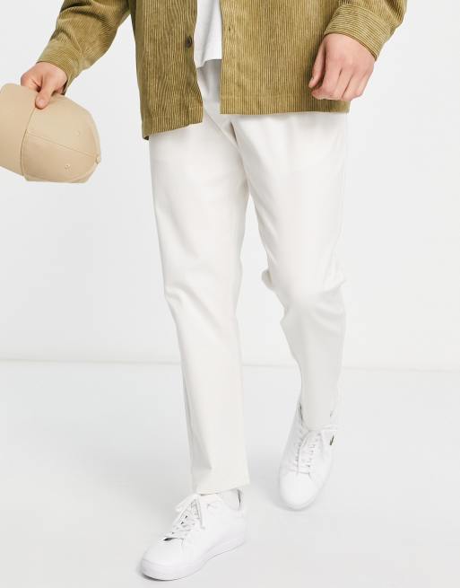 ASOS DESIGN – Kremowe chinosy o dopasowanym kroju z elastyczną talią