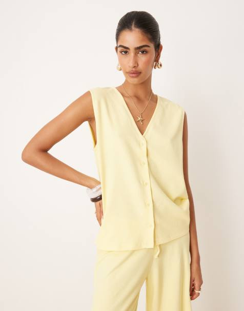 ASOS DESIGN textured knit oversized waistcoat in buttermilk