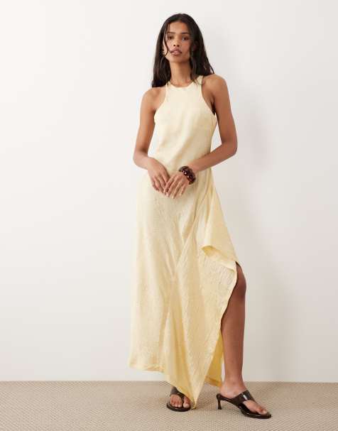 ASOS DESIGN – Kremowożółta satynowa sukienka midi o fasonie bokserki z falbanką z boku - view 1