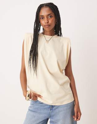 ASOS DESIGN – Kremowożółty top bez rękawów z poduszkami na ramionach - view 1