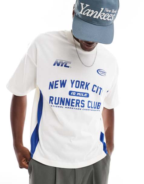 ASOS DESIGN boxy oversized t-shirt with cut and sew panelling and sports graphics in cream