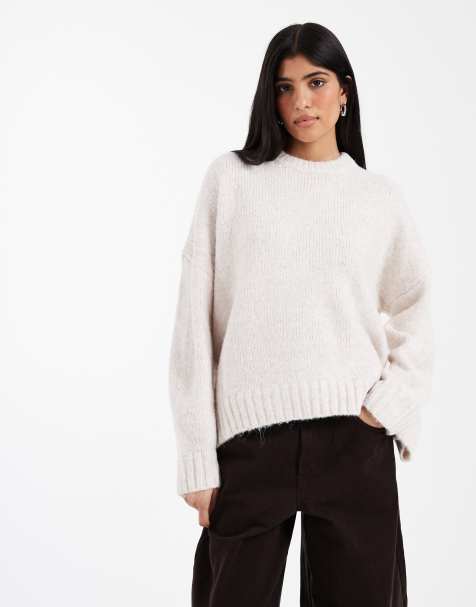 ASOS DESIGN oversized crew neck jumper with curved hem in cream