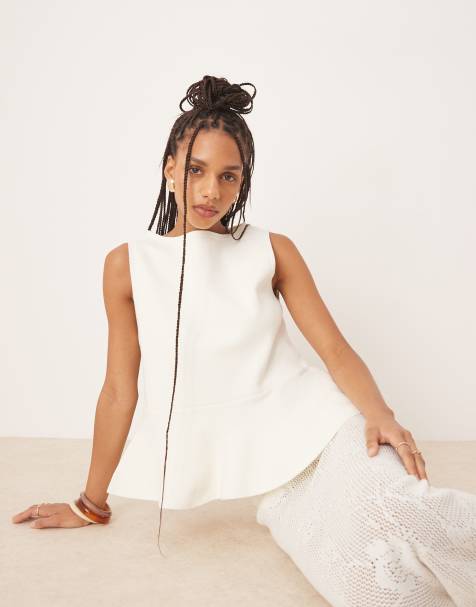 ASOS DESIGN knitted structured peplum top in cream 