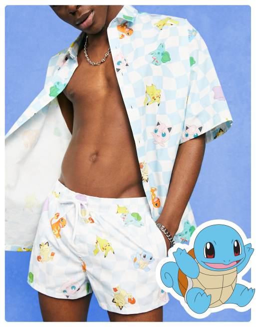 ASOS DESIGN – Krótkie szorty kąpielowe w szachownicę z motywem Pokemonów
