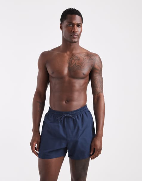 ASOS DESIGN – Kurz geschnittene Badeshorts in Marineblau - view 1