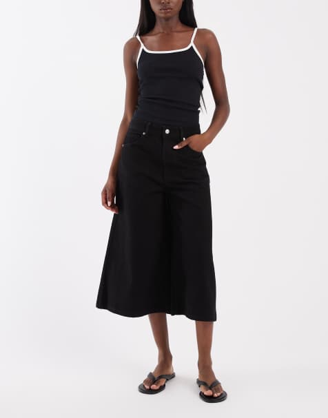 ASOS DESIGN – Kurz geschnittene Jeans in Schwarz mit weitem Bein - view 1